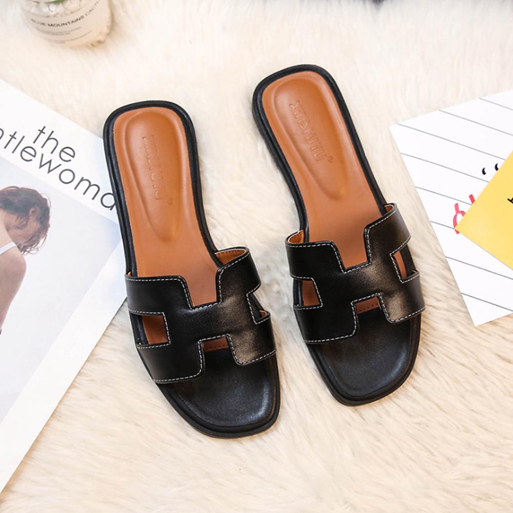 Sandali in pelle moderni con design a H