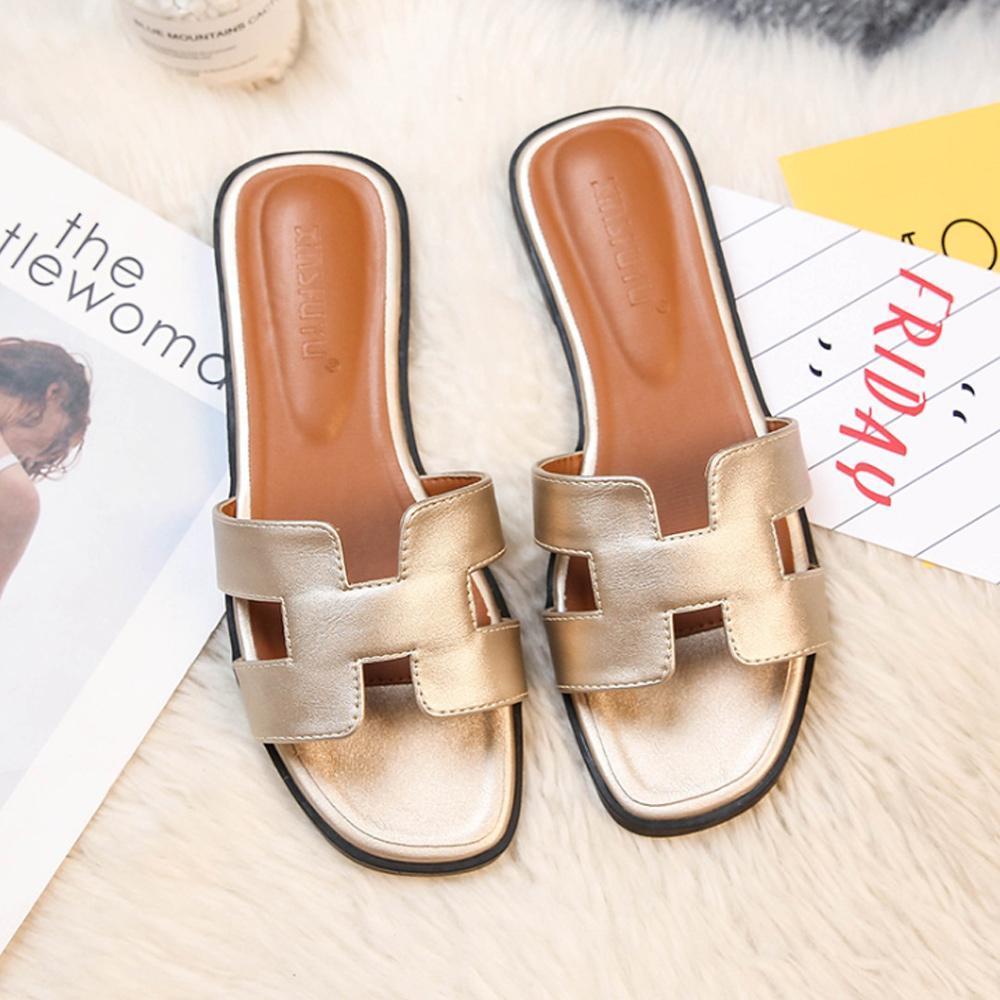 Sandali in pelle moderni con design a H