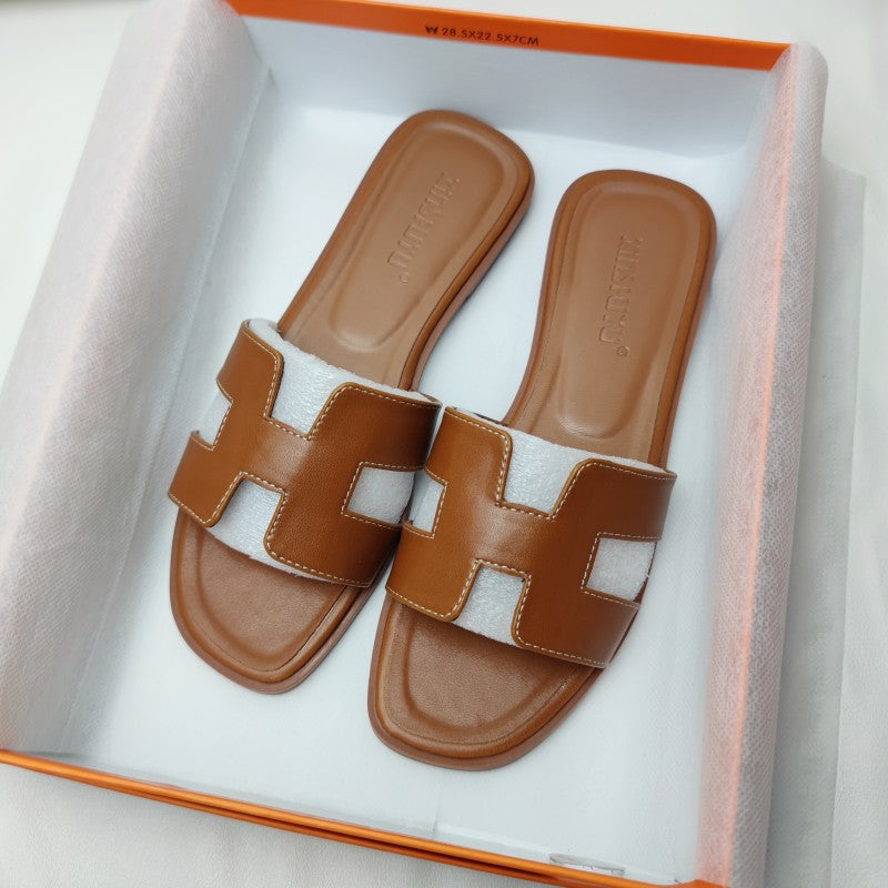 Sandali in pelle moderni con design a H