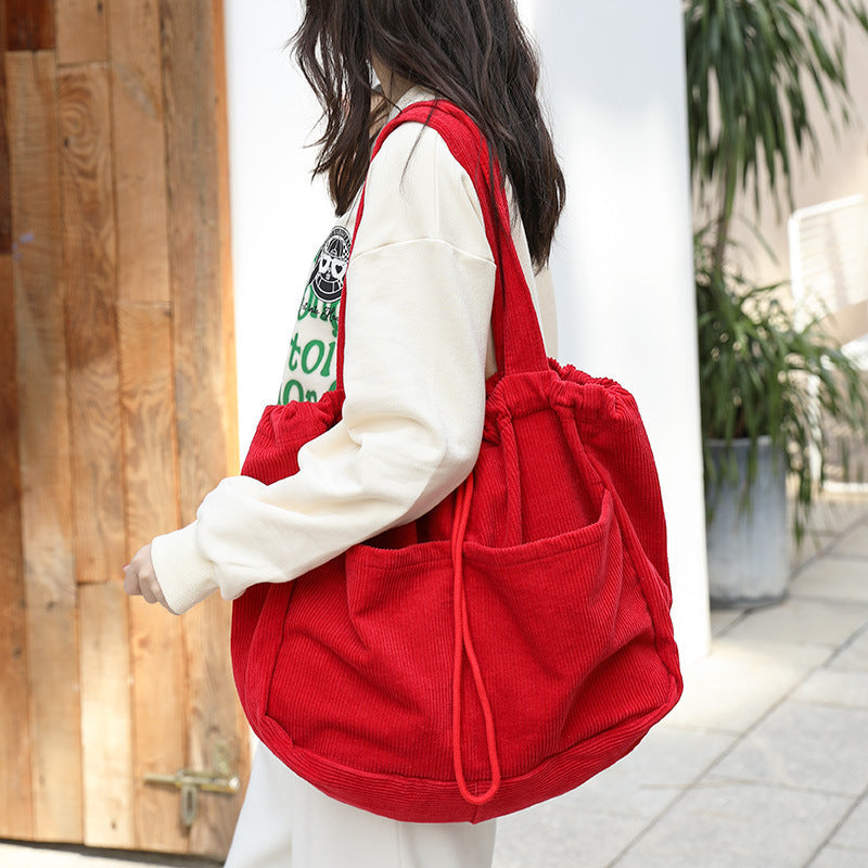 Borsa a tracolla in velluto a coste con tasche multiple