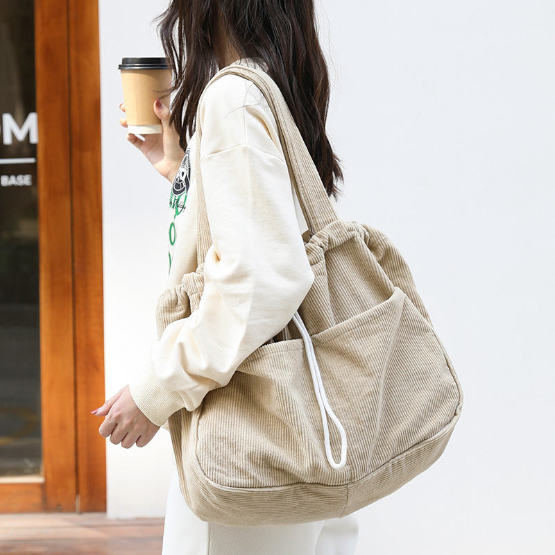 Borsa a tracolla in velluto a coste con tasche multiple