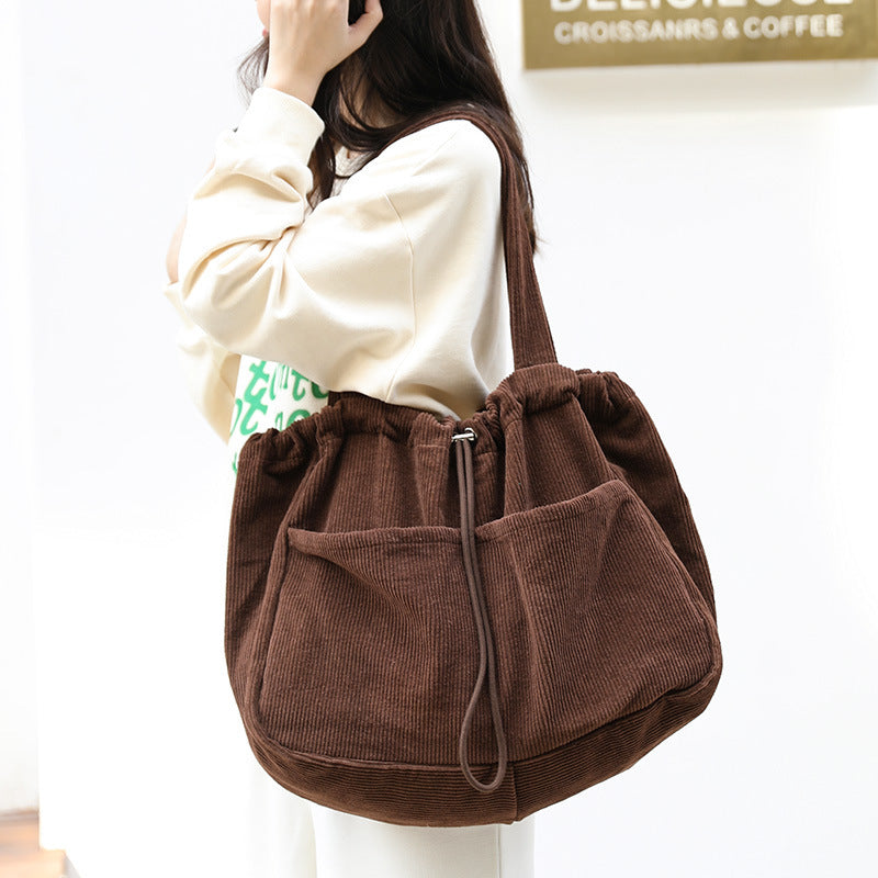 Borsa a tracolla in velluto a coste con tasche multiple