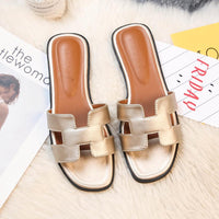 Sandali in pelle moderni con design a H