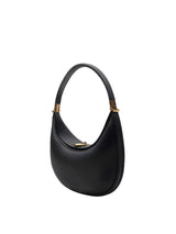 borsa a mezzaluna, borsa multifunzione, borsa a spalla, borsa elegante, borsa con tracolla, borsa fashion, borsa da lavoro, borsa da viaggio, borsa con scomparti, handbag versatile, borsa per uscite casual. In questa immagine è raffigurata una borsa a mezzaluna, elegante e multifunzione, ideale sia come borsa a spalla che con tracolla, adatta per lavoro, viaggi, tempo libero e look casual grazie ai suoi scomparti versatili.