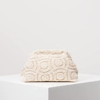 Clutch con trama intrecciata e chiusura magnetica