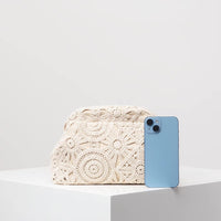 Clutch con trama intrecciata e chiusura magnetica