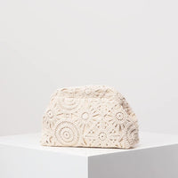 Clutch con trama intrecciata e chiusura magnetica