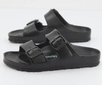 sandali in gomma, sandali estivi, sandali estivi donna, sandali comfort, sandali casual, sandali eleganti neri, sandali alla moda, sandali comodi, sandali con fibbie, sandali moda neri, sandali con fibbie regolabili, sandali con suola resistente. Sandali neri da donna dal design moderno, realizzati in gomma con fibbie regolabili e suola robusta, ideali per estate, comfort e stile casual elegante.