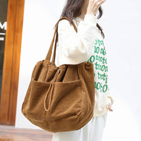 Borsa a tracolla in velluto a coste con tasche multiple