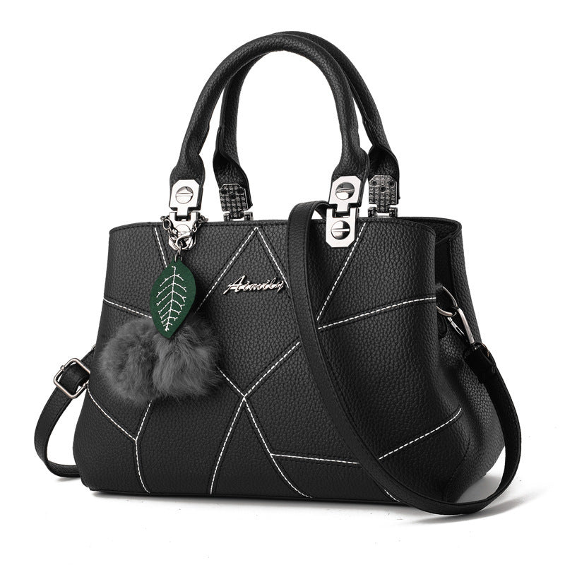 Borsa geometrica con pendente a sfera
