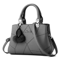 Borsa geometrica con pendente a sfera