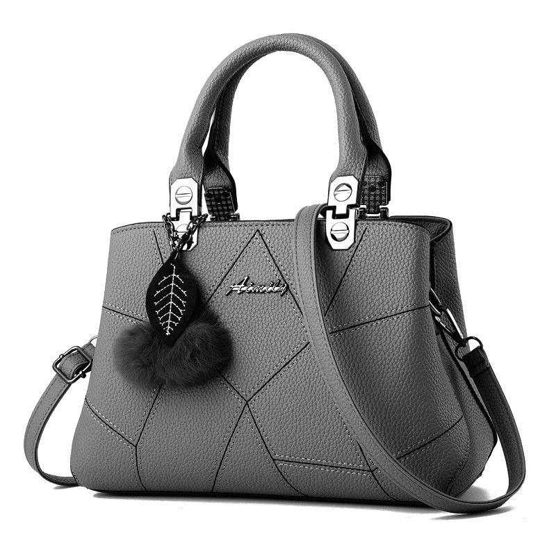 Borsa geometrica con pendente a sfera