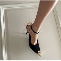 Oro – Tacchi catena oro