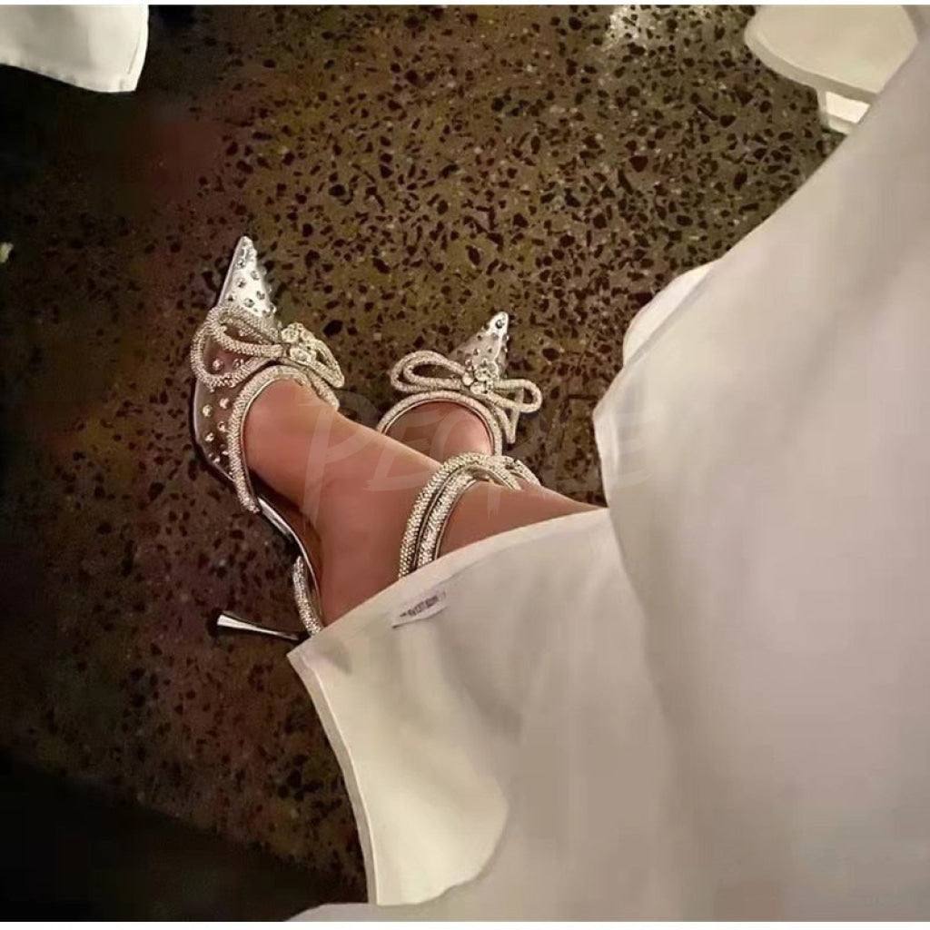 Tacchi trasparenti con strass e fiocco glitter